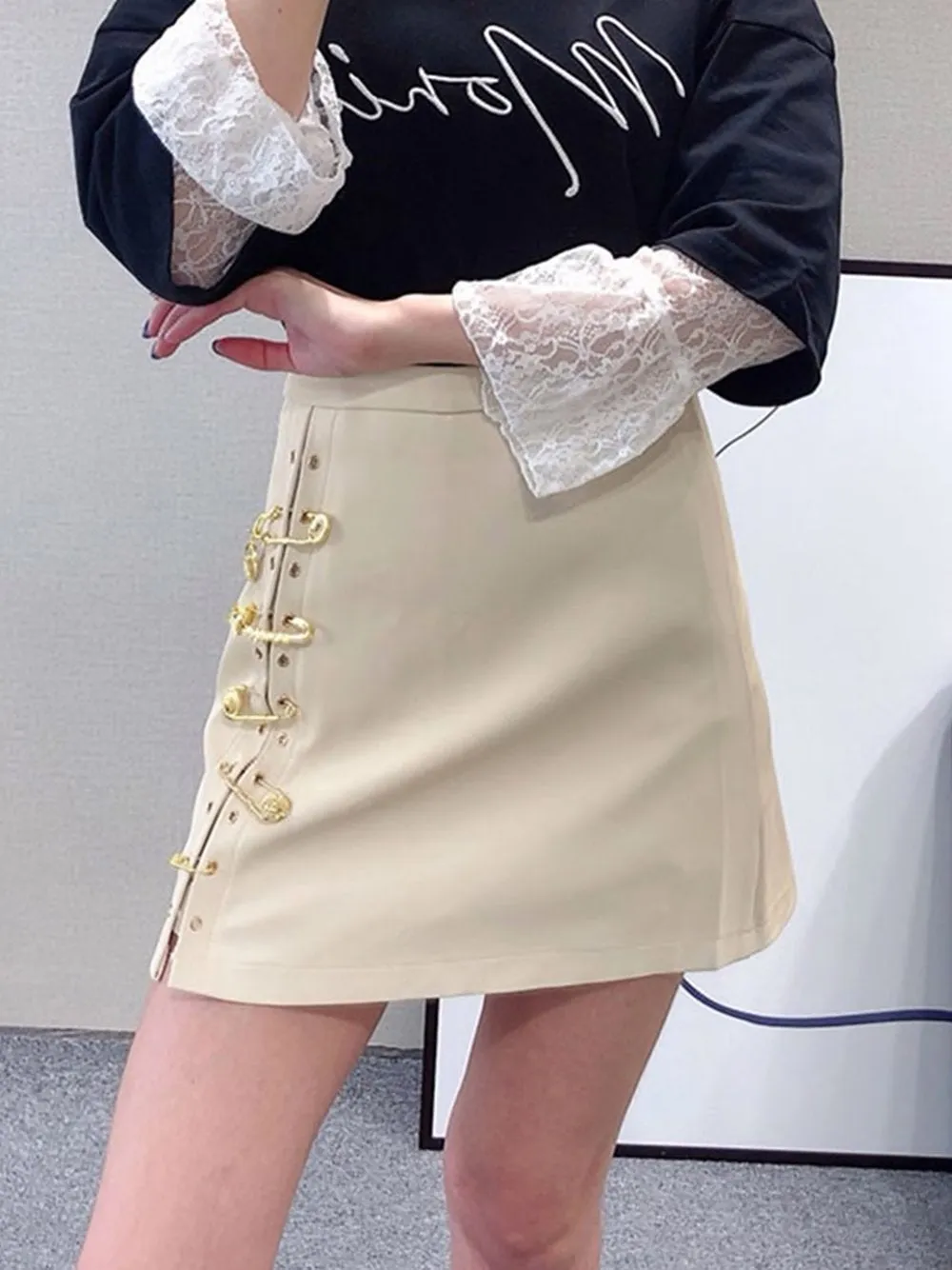 Asymmetrical Pins Leather Skirt