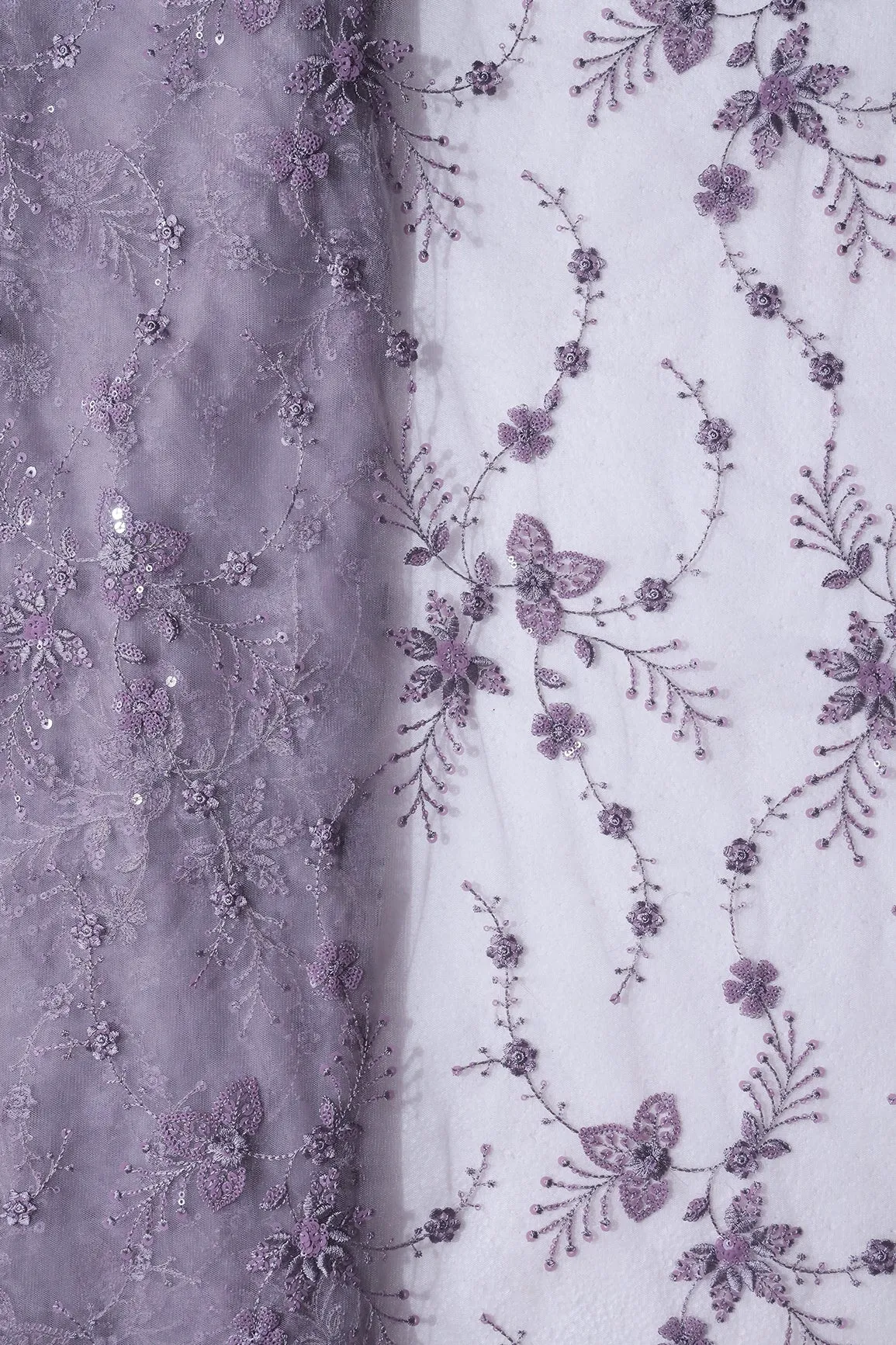 Beautiful Grey Thread With Sequins Floral Embroidery Work On Purple Grey Soft Net Fabric