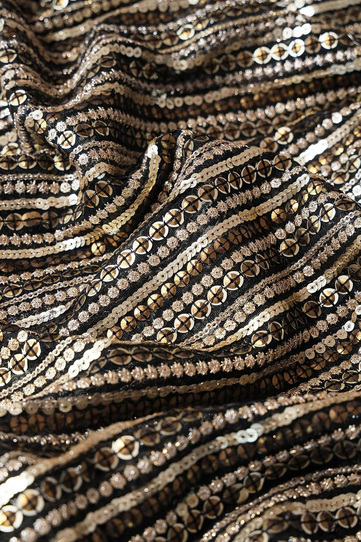 Beautiful Heavy Sequins With Zari Stripes Embroidery On Black Soft Net Fabric