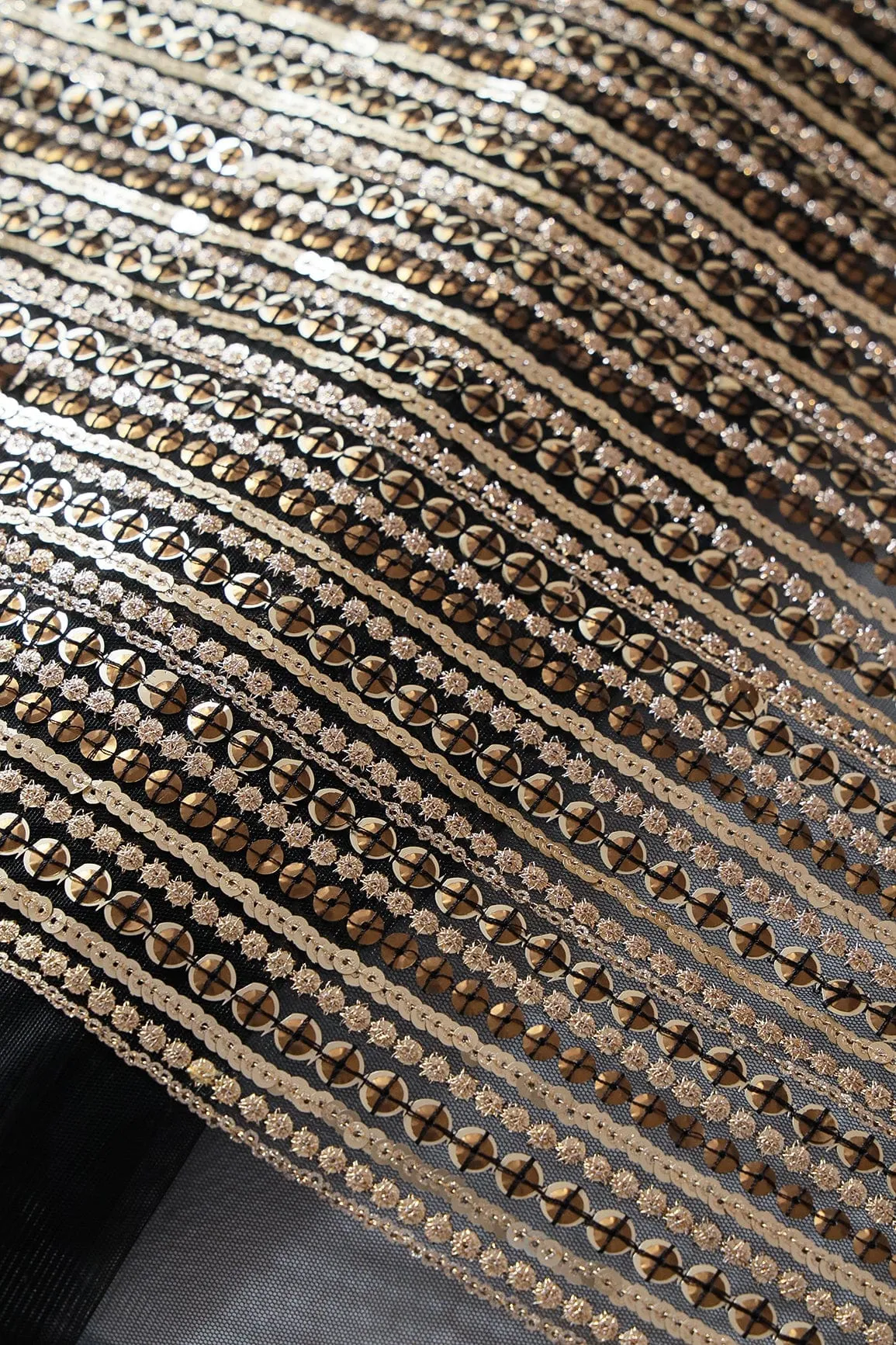 Beautiful Heavy Sequins With Zari Stripes Embroidery On Black Soft Net Fabric